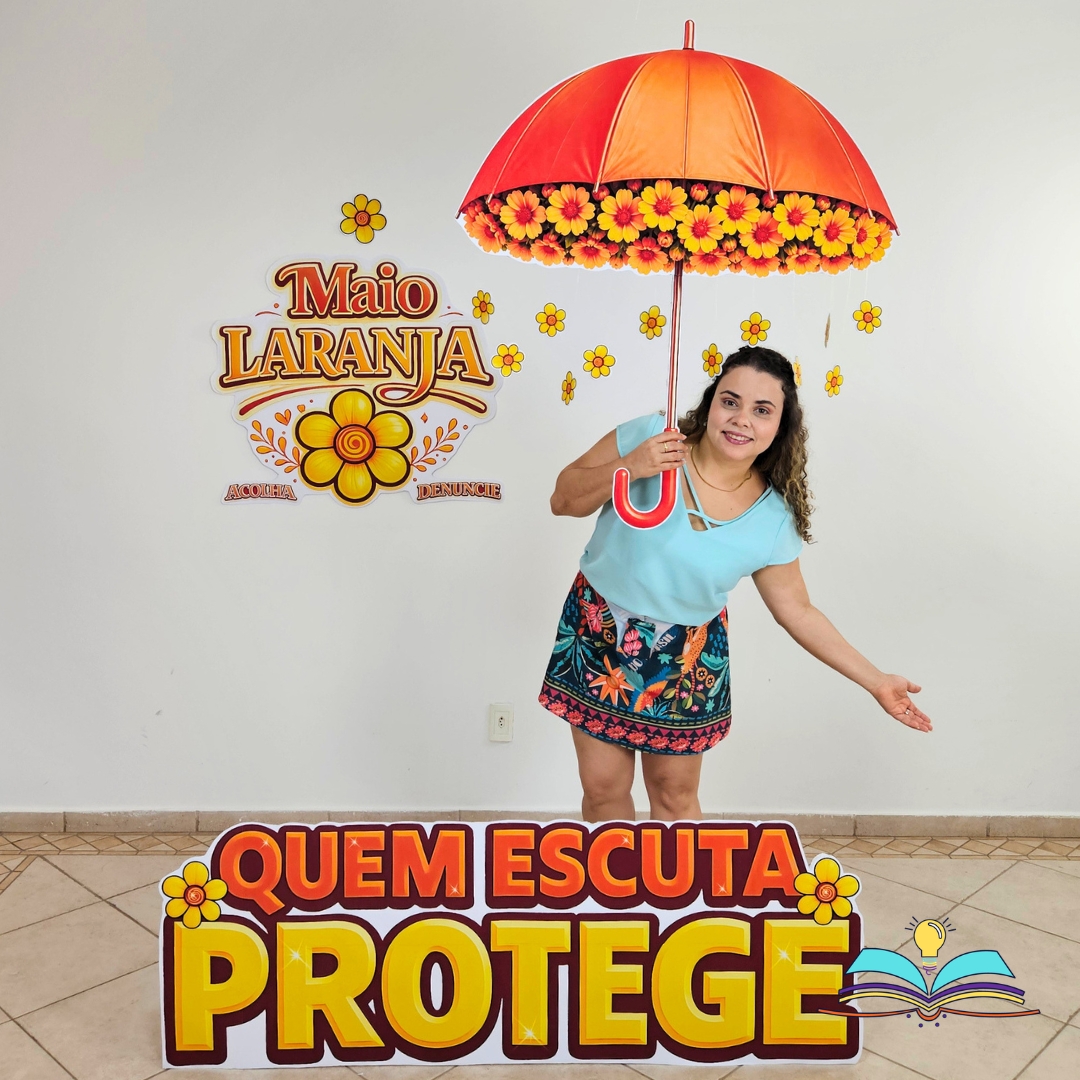 Guarda-chuva com o tema Maio Laranja, educativo para orientar, conscientizar e promover cuidado, atenção e proteção infantil.
